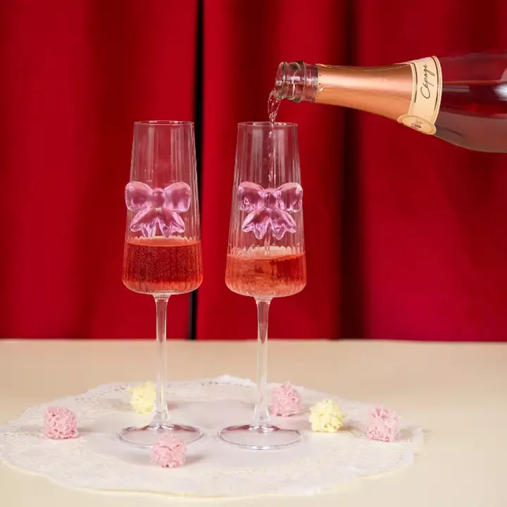 COFFRET 2 FLÛTES CHAMPAGNE VERRE NOEUD ROSE – L’EXPRESSIONIST